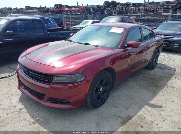 2C3CDXBG4MH548268 2021 DODGE CHARGER Maroon Vista tres cuartos delantera izquierda