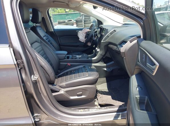2FMPK4J95PBA07642 2023 FORD EDGE Gray Front interior view