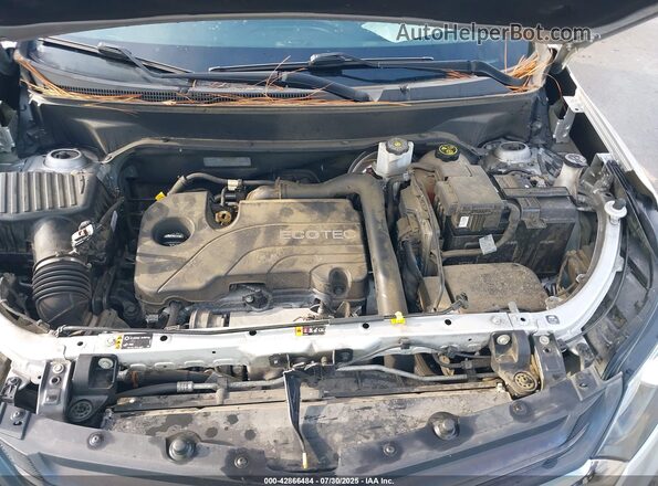 2GNAXJEV0J6220944 2018 CHEVROLET EQUINOX Silver Widok z tyłu