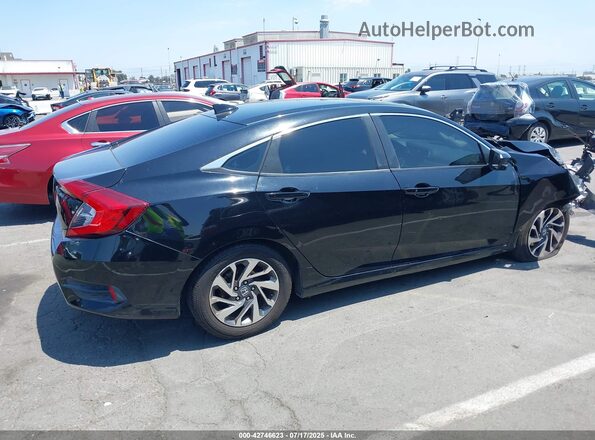 2HGFC2F79JH526563 2018 HONDA CIVIC Черный Вид задней части салона