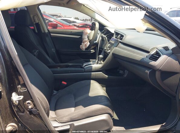 2HGFC2F79JH526563 2018 HONDA CIVIC Черный Вид салона спереди