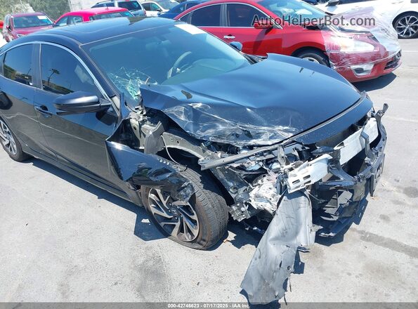2HGFC2F79JH526563 2018 HONDA CIVIC Черный Вид спереди