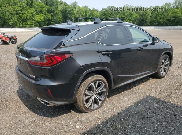2T2BZMCA4HC127602 2017 LEXUS RX Черный Задняя правая четверть