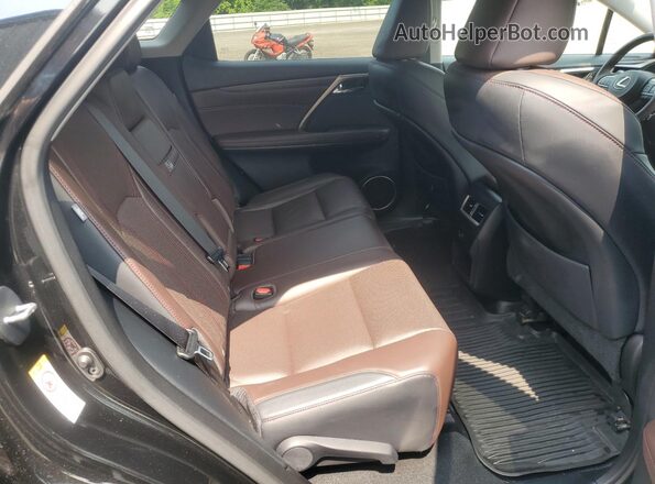 2T2BZMCA4HC127602 2017 LEXUS RX Черный Вид задней части салона