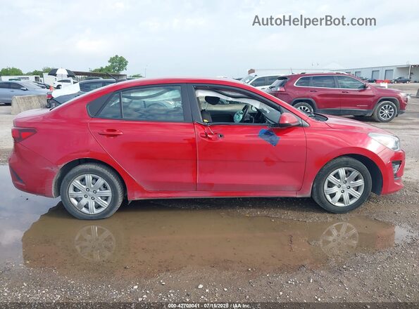 3KPA24ADXPE524765 2023 KIA RIO Красный Вид задней части салона