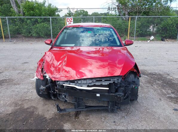 3KPF24AD0ME330473 2021 KIA FORTE Maroon Вид задньої частини салону