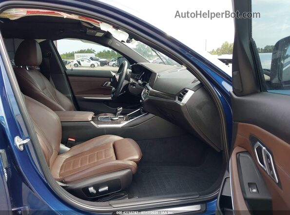 3MW5R7J07N8C63826 2022 BMW 3 SERIES Blue წინა სალონის ხედი