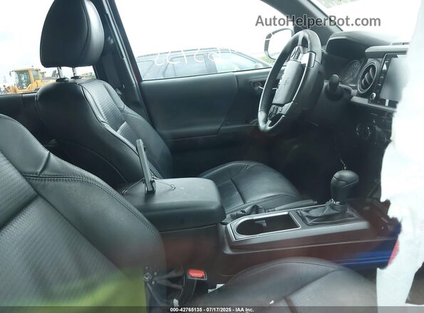 3TMCZ5AN9MM440876 2021 TOYOTA TACOMA Red Вид салону спереду