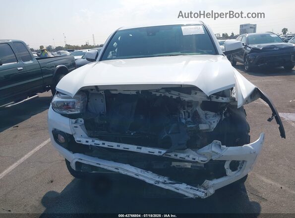 3TMCZ5ANXLM360758 2020 TOYOTA TACOMA White Rear interior view
