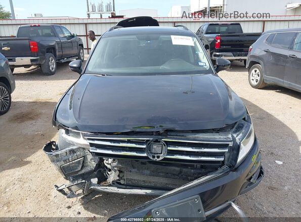 3VV3B7AX7MM043668 2021 VOLKSWAGEN TIGUAN Black Widok wnętrza z tyłu