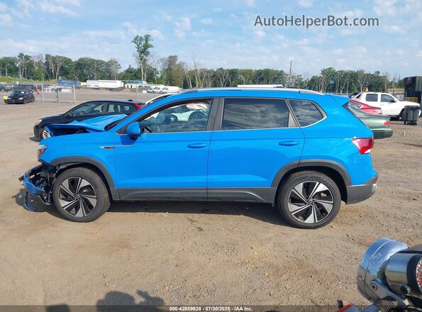 3VVVX7B20PM358345 2023 VOLKSWAGEN TAOS Blue Սալոնի հետևի տեսք