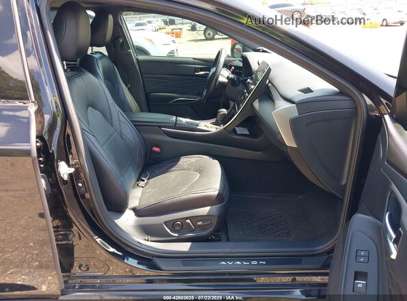 4T1DA1AB0MU003897 2021 TOYOTA LIMITED Black წინა სალონის ხედი