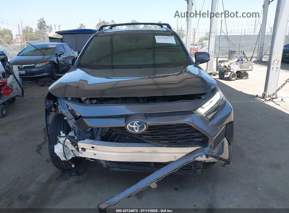 4T3T6RFVXPU114077 2023 TOYOTA RAV4 HYBRID Gray Вид задньої частини салону