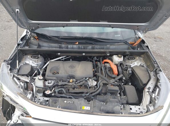 4T3T6RFVXPU128688 2023 TOYOTA RAV4 HYBRID Silver Rear view