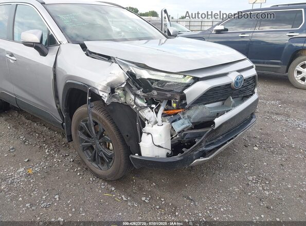 4T3T6RFVXPU128688 2023 TOYOTA RAV4 HYBRID Silver Front view