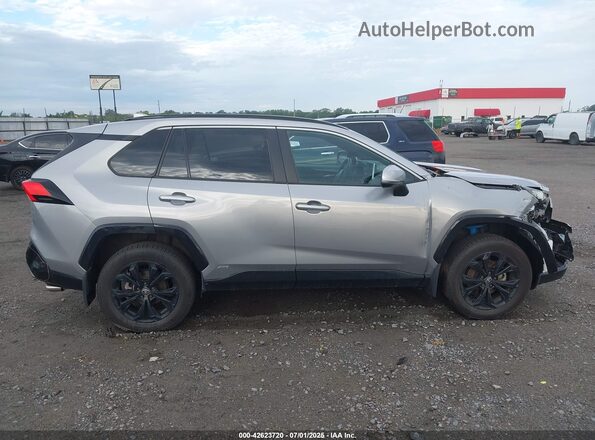 4T3T6RFVXPU128688 2023 TOYOTA RAV4 HYBRID Silver Rear interior view