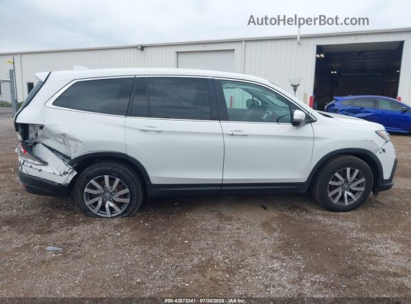 5FNYF6H56MB064149 2021 HONDA PILOT Белый Вид задней части салона