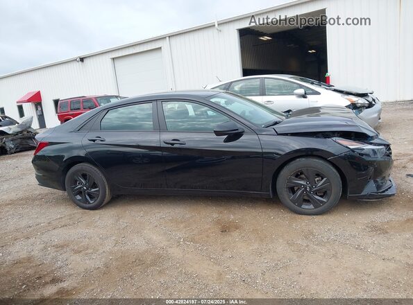 5NPLM4AG6MH002087 2021 HYUNDAI ELANTRA Black Rear interior view