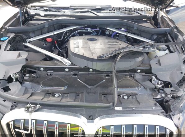 5UX23EM08S9Y16412 2025 BMW X7 Black Vista trasera