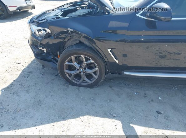 5UXTY3C05M9H28810 2021 BMW X3 Black Front view