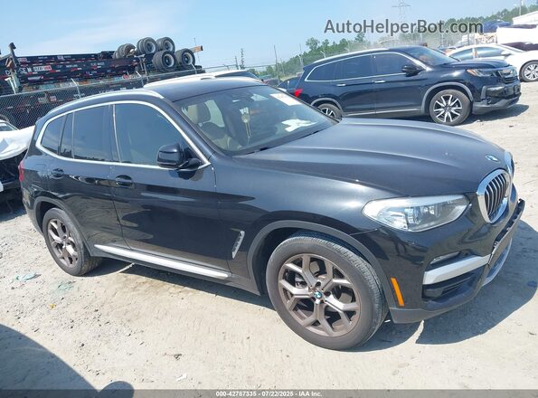 5UXTY3C05M9H28810 2021 BMW X3 Black Rear interior view