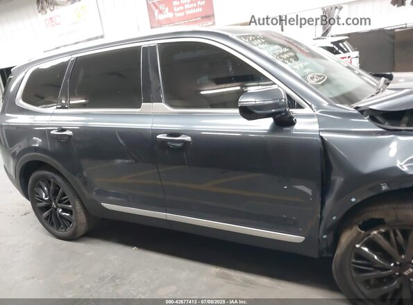 5XYP54HC3MG129095 2021 KIA TELLURIDE Gray Vista interior trasera