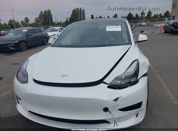 5YJ3E1EB3PF634557 2023 TESLA MODEL 3 White ხელსაწყოთა პანელის ხედი