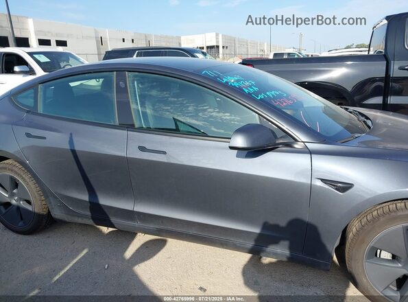 5YJ3E1EB9PF391367 2023 TESLA MODEL 3 Gray Widok wnętrza z tyłu