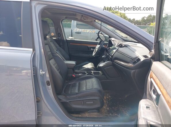 7FARW2H83ME033078 2021 HONDA CR-V Blue Front interior view