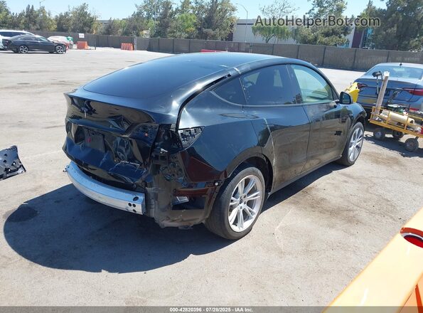 7SAYGAEE6PF904152 2023 TESLA MODEL Y Black უკანა მარჯვენა
