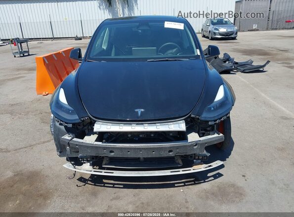 7SAYGAEE6PF904152 2023 TESLA MODEL Y Black უკანა სალონის ხედი