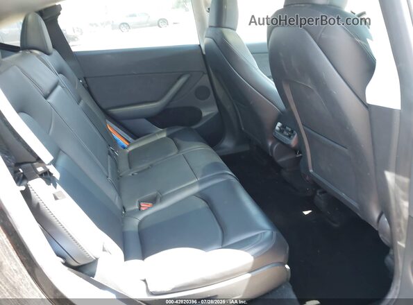 7SAYGAEE6PF904152 2023 TESLA MODEL Y Black VIN კოდის სტიკერის ხედი