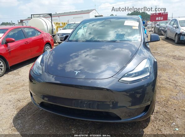 7SAYGDEE2RA273241 2024 TESLA MODEL Y Black Սալոնի հետևի տեսք