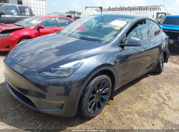 7SAYGDEE2RA273241 2024 TESLA MODEL Y Black Առջևի ձախ երեք քառորդ տեսարան