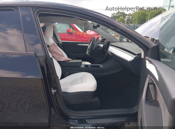 7SAYGDEE4RF161429 2024 TESLA MODEL Y Black 
