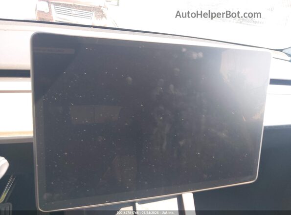 7SAYGDEE9SF219847 2025 TESLA MODEL Y Silver უკანა სავარძლების ხედი
