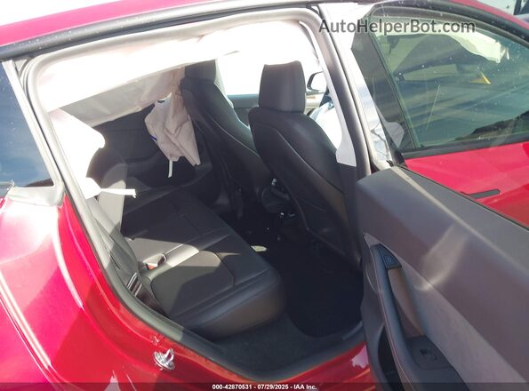 7SAYGDEF7RF105137 2024 TESLA MODEL Y Red VIN sticker view