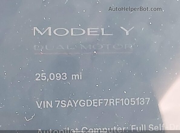 7SAYGDEF7RF105137 2024 TESLA MODEL Y Red Rear seats view