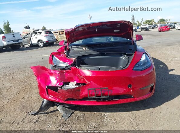 7SAYGDEF7RF105137 2024 TESLA MODEL Y Red Instrument cluster view