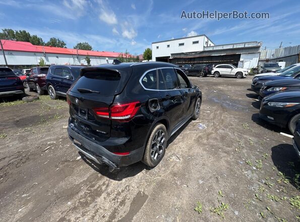 WBXJG9C08M5T96965 2021 BMW X1 Black 