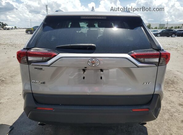 JTMW1RFV7MD062055 2021 TOYOTA LE Silver Rear view
