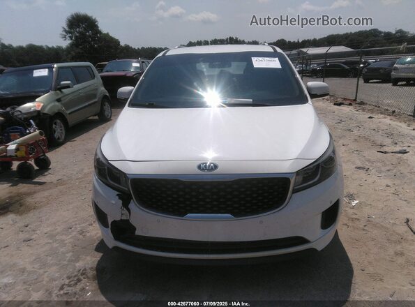 KNDMB5C17H6332877 2017 KIA SEDONA White უკანა სალონის ხედი