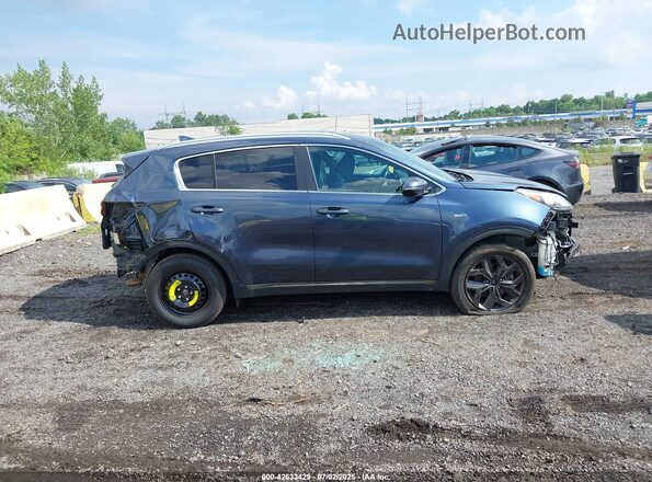KNDP6CACXM7906127 2021 KIA SPORTAGE Dark Blue Rear interior view
