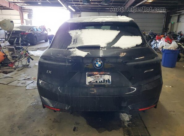 WB523CF02SCS86536 2025 BMW IX Black Rear view