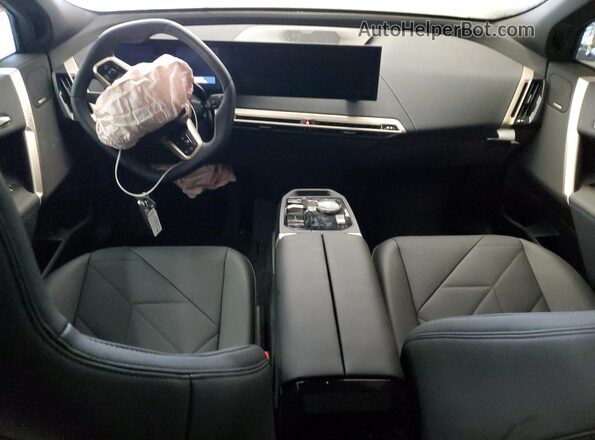 WB523CF02SCS86536 2025 BMW IX Black Dashboard view