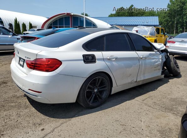 WBA4F9C53HG439866 2017 BMW 4 SERIES White Trasero derecho