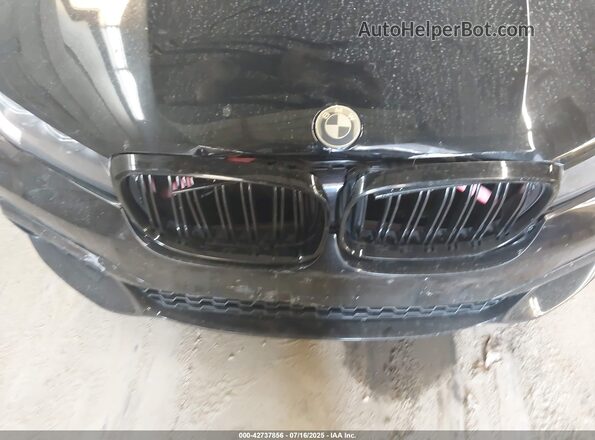 WBA7E4C59HGU99489 2017 BMW 7 SERIES Black Vista frontal