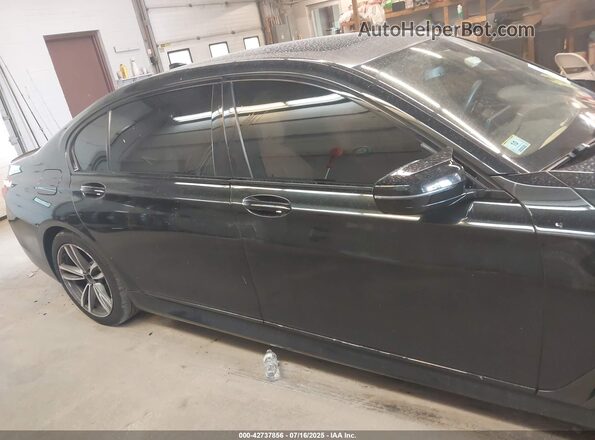 WBA7E4C59HGU99489 2017 BMW 7 SERIES Black Vista interior trasera