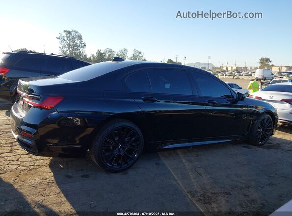 WBA7T2C03LGL17910 2020 BMW 7 SERIES Черный Вид задней части салона