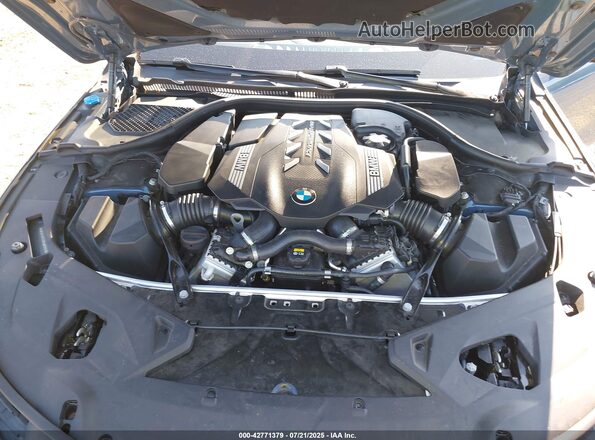 WBAGV8C02NCH89994 2022 BMW M8 Синий Вид сзади